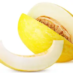 En saftig honungsmelon, skuren för att visa dess frön. Perfekt för en lätt och hälsosam snack med lågt honungsmelon kcal-innehåll.